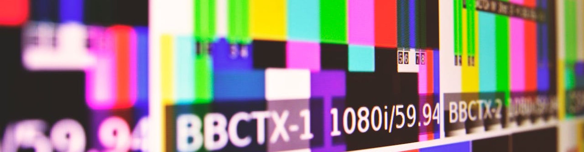 Vibrant test pattern screen with colorful bars and modern design.